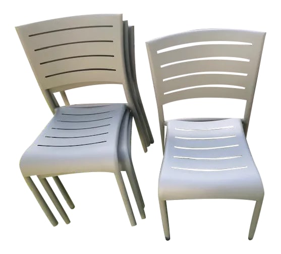 Florida Seating Coated Metal Chairs - Set of 4: This Set of Four Chairs by Florida Seating are perfect for any patio or extra seating. Chairs are a light creamy beige in a Coated Metal. The coating allows the chairs to remain cool and to never fade