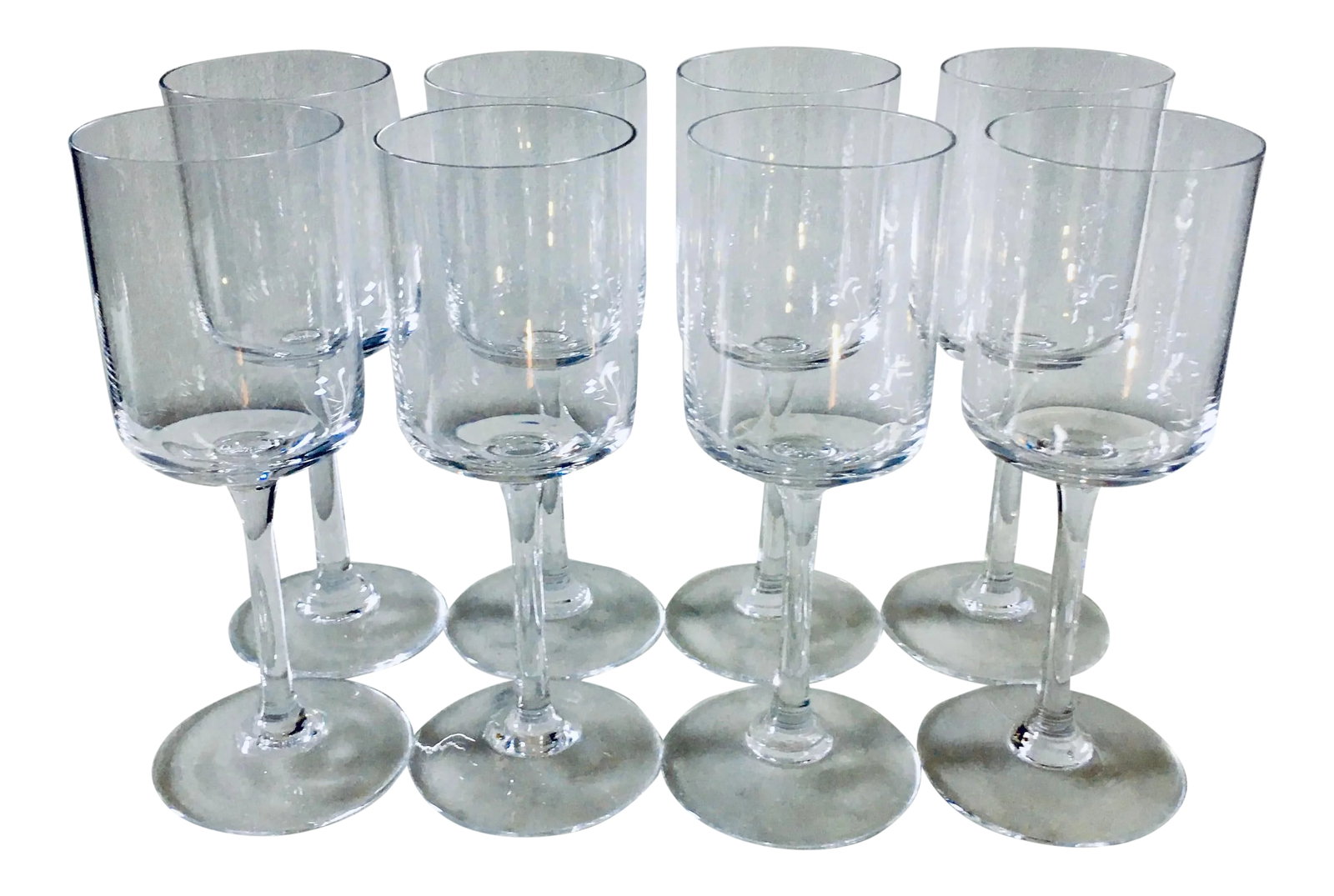 Vintage Crystal Modernist Glassware - Set of 8: Set of 8 vintage stemware/goblets with a sleek modernist, geometric feel. These feel have a nice weight and are luxurious in hand. One glass has a small chip at its base; please see the last photo.