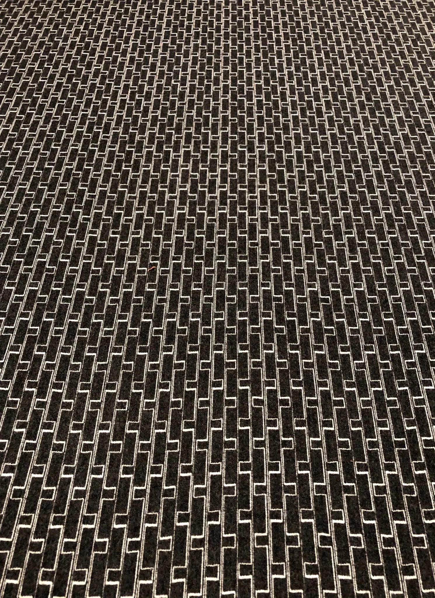 Holland + Sherry Django - Modern Obsidian 100% Wool Black and White Multipurpose Fabric - 3 Yards: This multipurpose fabric is a great choice for drapery or upholstery. It has a super soft hand and a flexible stretch due to the 100% wool construction. This fabric is a first quality good and