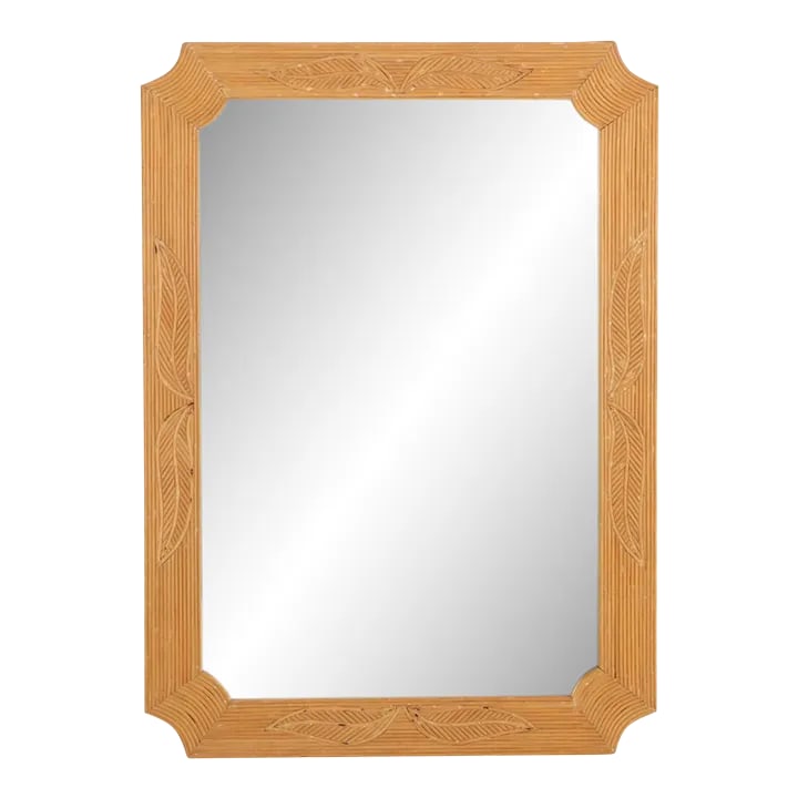 A French Rattan Mirror, C 1970.: The large rectangular frame has cut corners and leaf designs inset in all 4 sides. This natural and neutral mirror will work in and enhance a variety of interiors, but especially in coastal and beach