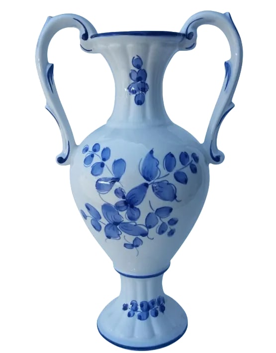 Vintage Hand-Painted Portugese Vase: Lovely vintage hand-painted porcelain vase adorned with vines and flowers. Two handles and a delicate pedestal base keep it elegant. Would be stunning filled with fresh picked wildflowers! The mouth