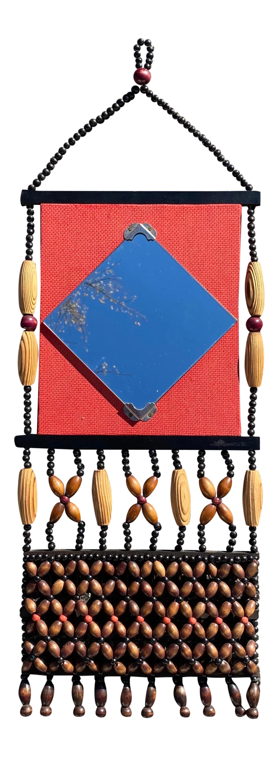 Mid 20th Century Boho Beaded Mirror and Pocket Wall Hanging: Keep this functional and stylish piece hanging by your door to check your face and stash your bills before stepping out. The pattern of natural wooden beads and rich red backing will give the room an 