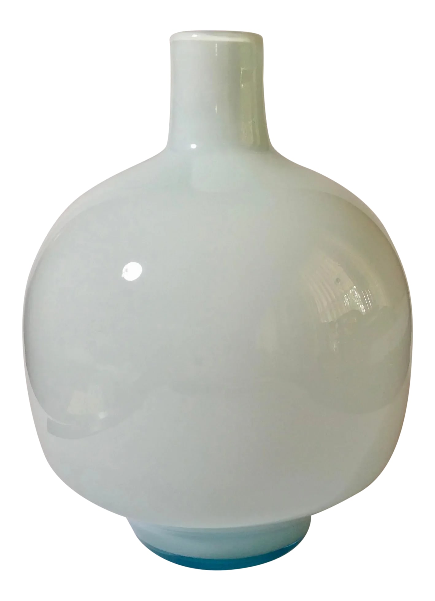 1970s Cased Glass White With Tourquoise Vase: Simple yet elegantly toned white vase with a slight hint of turquoise that melts down to a distinct turquoise base. Condition: Alterations: Original Condition Unaltered Imperfections: Some