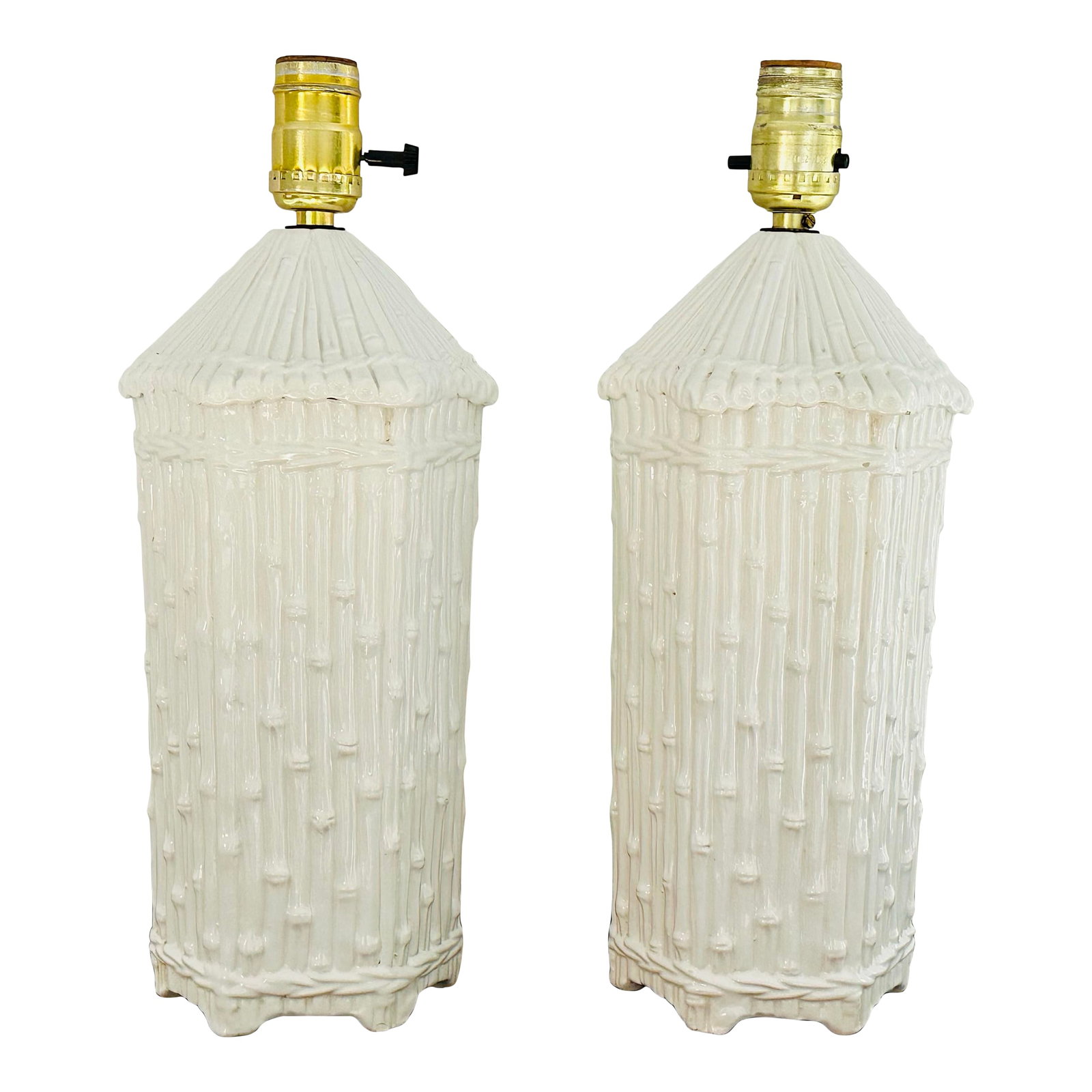 Pair of Italian Mid Century Faux Bamboo Pagoda Lamps: Straight out of an exquisite Sea Island, Ga. estate, a pair of white Italian ceramic lamps that are just wonderful. Think Lyford Cay, Hollywood regency. The white gives you lots of shade choices.
