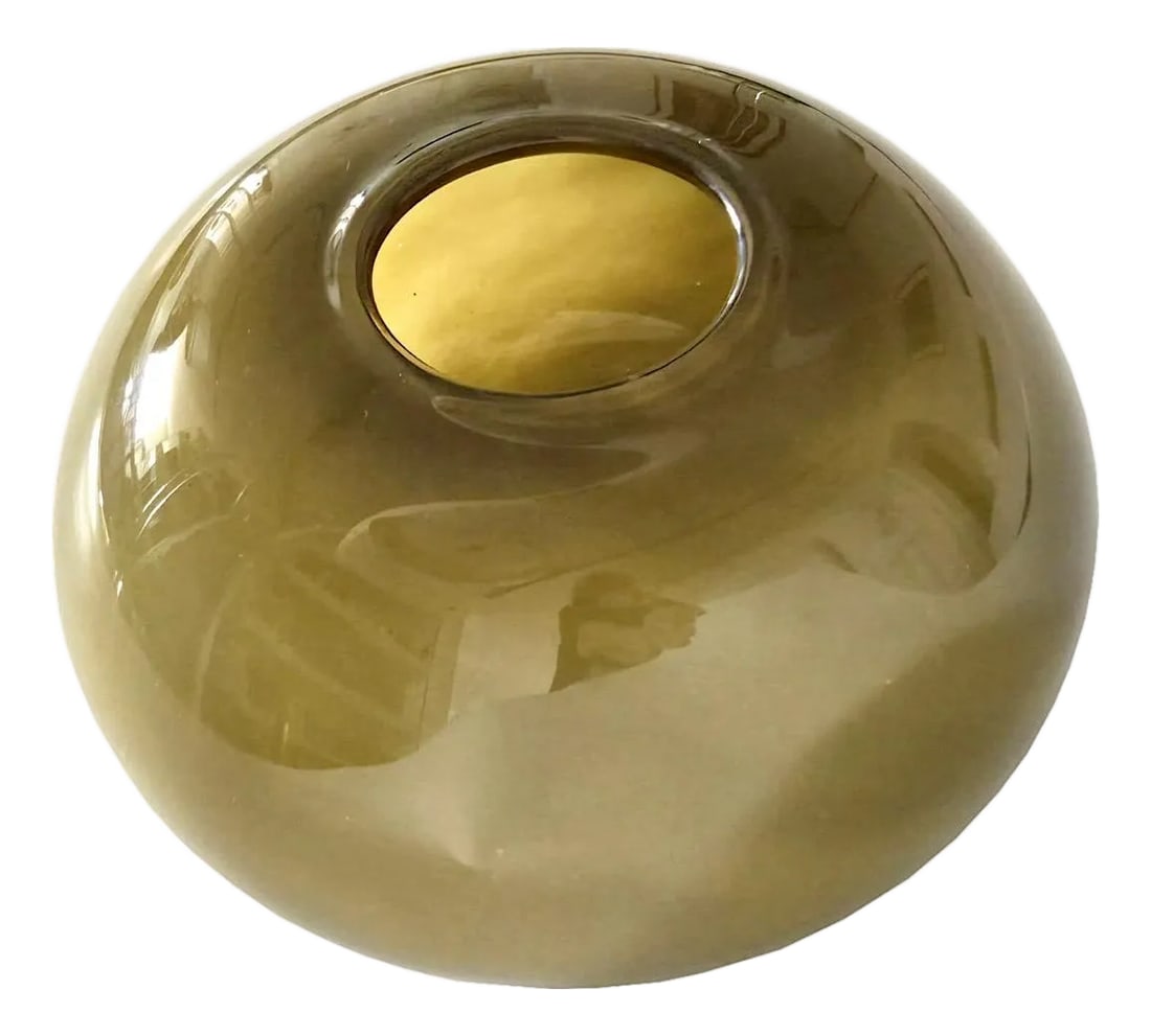 1970s Hand Blown Art Glass Orb/Donut Vase Attributed to Barbini, Murano: Offered is a large, sleek hand blown cased art glass orb/donut/low vase attributed to Alfredo Barbini of Murano, Italy. The images were all taken in natural daylight to highlight the nuanced colors,