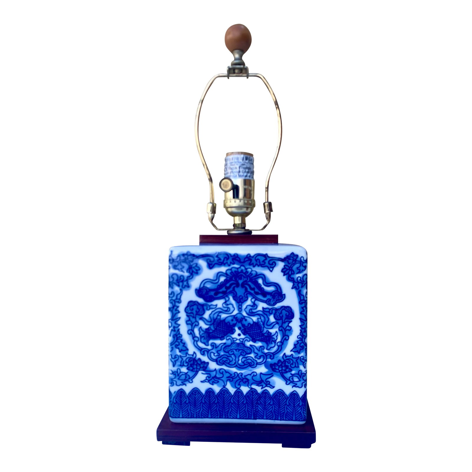 Ralph Lauren Blue and White Porcelain Koi Fish Table Lamp .: Ralph Lauren blue and white porcelain table lamp featuring a chinoiserie-inspired koi fish and butterfly design. The square porcelain body sits on a wooden base, and the overall aesthetic is