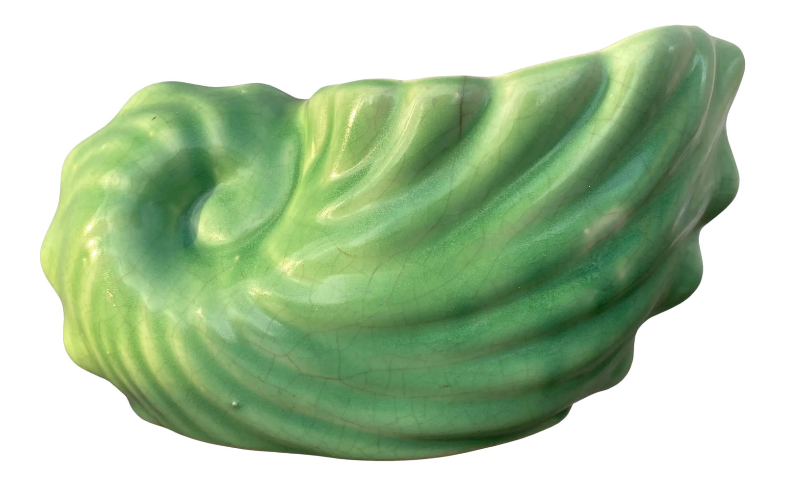 Ceramic Nautilus Shell Planter: Fredericksburg Art Pottery, or FAPCO, was an Ohio company that was in business from 1910-1965. This vintage nautilus shell planter is in a mint green color glaze. It is unmarked, produced in the 50's.