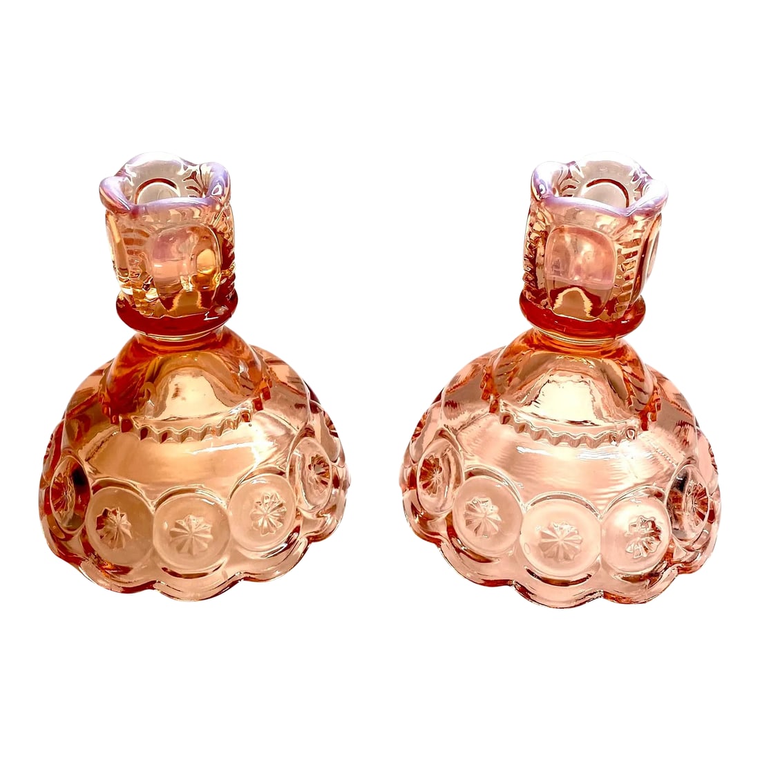 Mid 20th Century Pink Depression Glass Candlesticks - Set of 2: The two vintage candlesticks are a lovely pink depression glass. There's a bit of opalescence on the tops. They are from early to mid 20th century and belonged to my grandmother. There's a matching