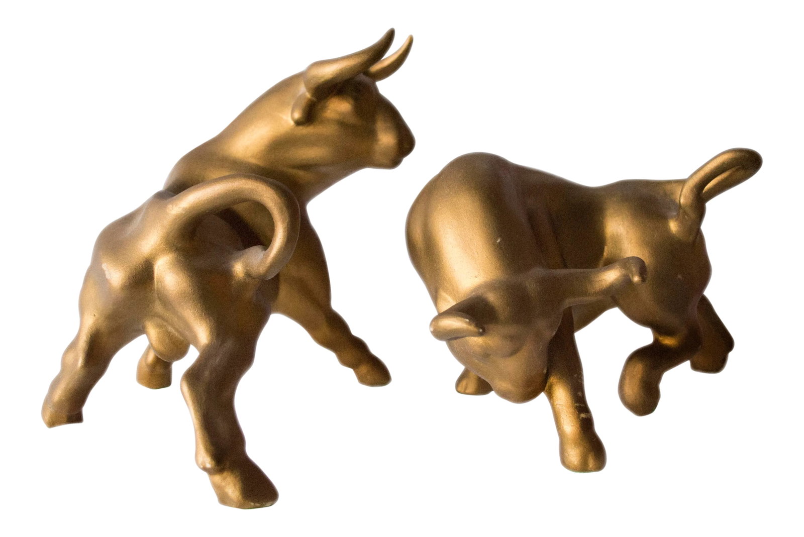 Vintage Ceramic Gold Metallic Bulls - A Pair: Midcentury pair of matte gold metallic ceramic fighting bulls. These are in good condition. Some chips, minor wear. Taller Bull: 11"L x 6.75"D x 8.5"H Shorter Bull: 11"L x 6.75"D x 6.25"H Condition: