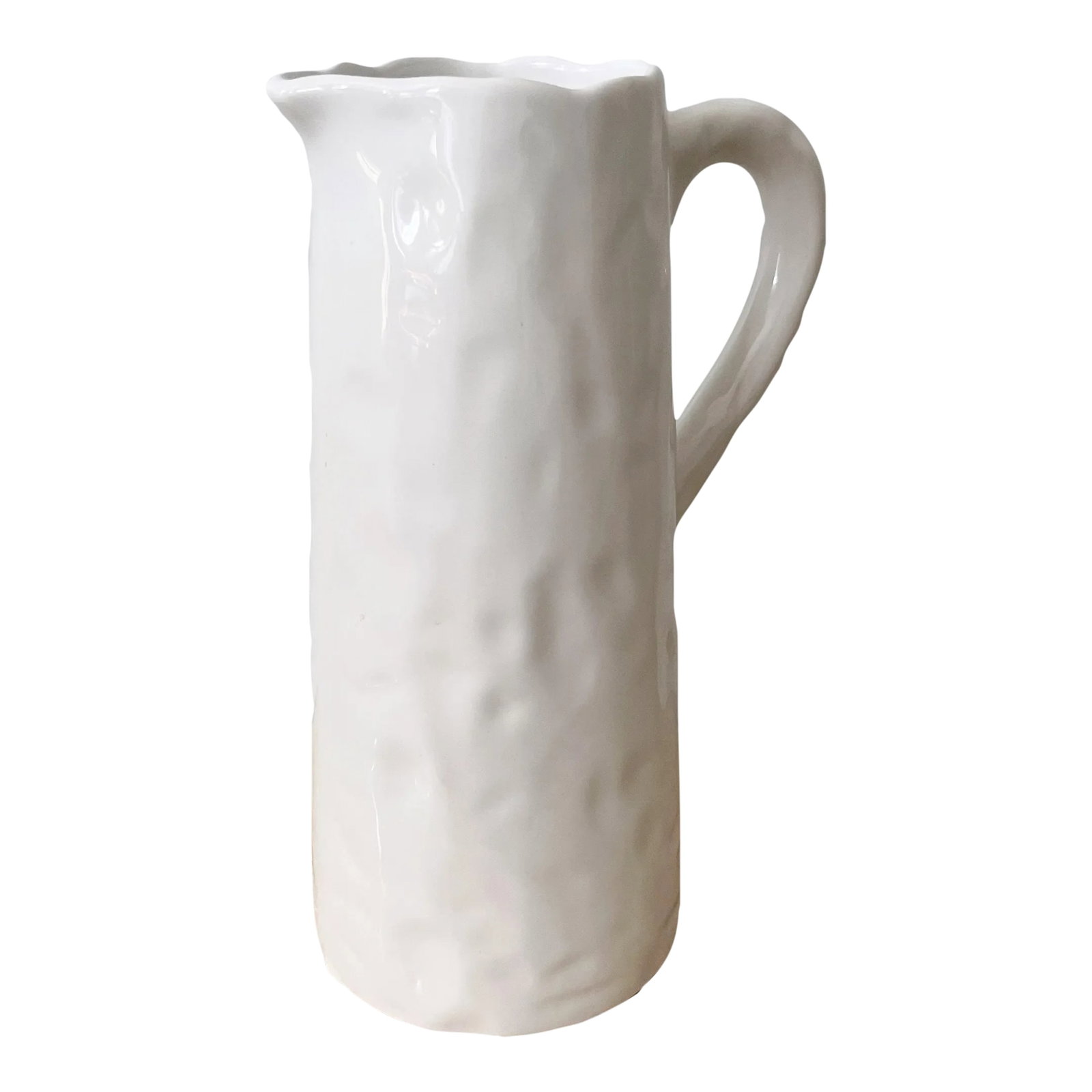 Modern White Ceramic Made in Portugal Pitcher: Modern white ceramic pitcher, with subtle indent design, made in Portugal. Could be used as vase, as decor. Dimensions: 9" wide at handle x 5.5" deep x 12" high Condition: Alterations: Original