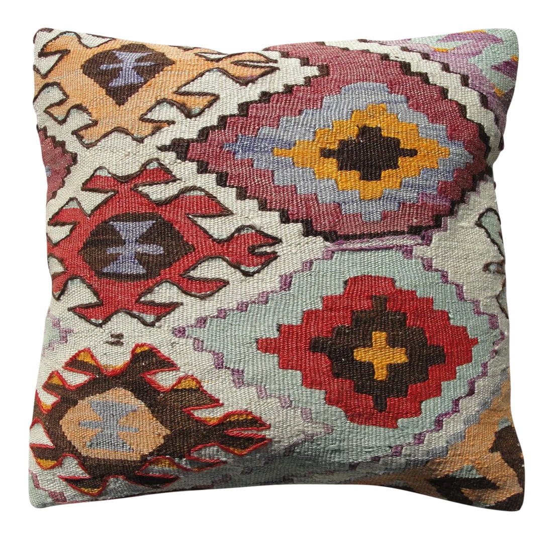 Kilim Rug Pillow: Kilim Rug Pillow Made from old turkish kilims Back side cotton and has closed with a solid hidden zipper size:16" x 16" It is ready to use. The colors come from vegetable dyes. Condition: Condition
