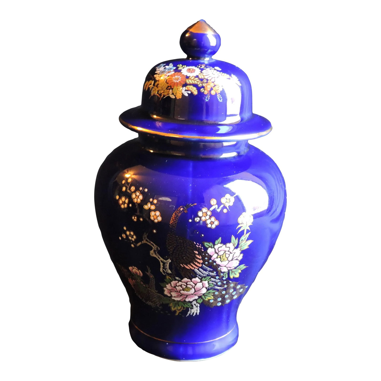 Circa 1970's Kutani Ware Cobalt Blue Peacock Ginger Jar Hand Painted Made in Japan: This hand painted cobalt blue ginger jar was made by the Kutani Ware Co. and it was hand painted in Japan around the 1970's. This ginger jar was made with a deep cobalt blue glaze that was then hand p