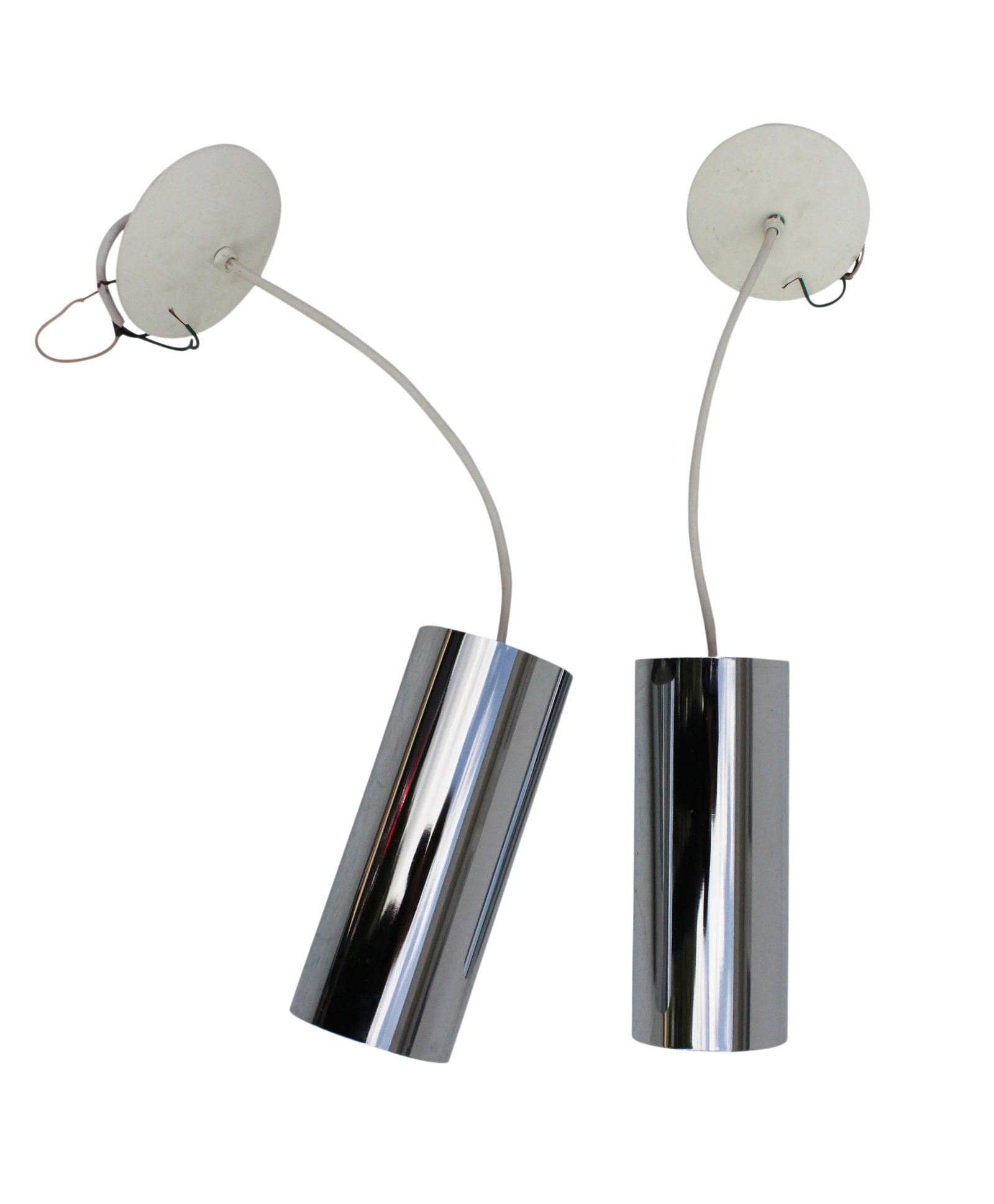 Lightolier Cylindrical Chrome Pendants - A Pair: USA, 1960s Pair of minimal, modernist cylindrical chrome pendants by Lightolier. A very nice larger size. Clean lined and very well made. DIMENSIONS: 5"W X 5"D X 12"H, Height of cord and pendant: