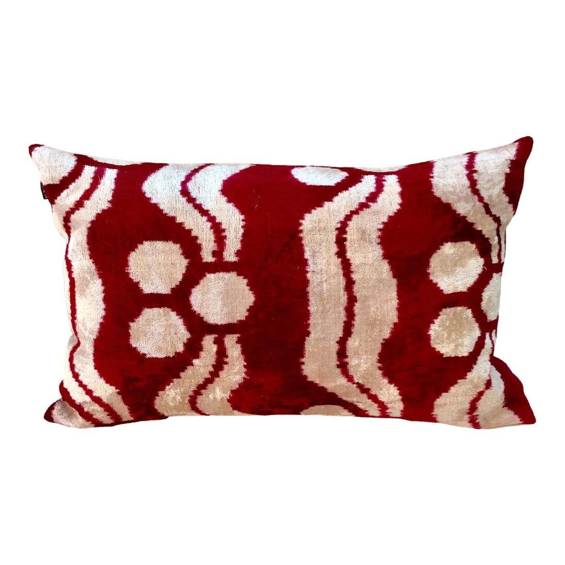 Turkish Hand Woven Velvet Ikat Pillow: This Velvet Ikat Pillow is hand woven and dyed in deep reds and whites. The linen blend backing features a hidden zipper closure for the down pillow insert which is included. This gorgeous pillow will