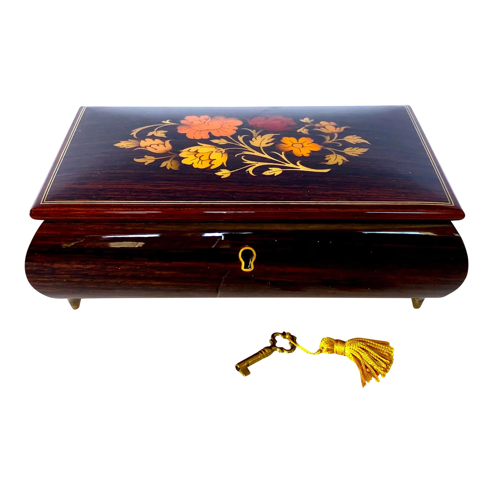 Italian Reuge Music Box With Key: Beautiful Italian Reuge music box has a rich dark brown base and is enhanced with a floral display on top in a range of oranges. Lily Marieen is played on a Swiss movement. Elevated on brass feet and