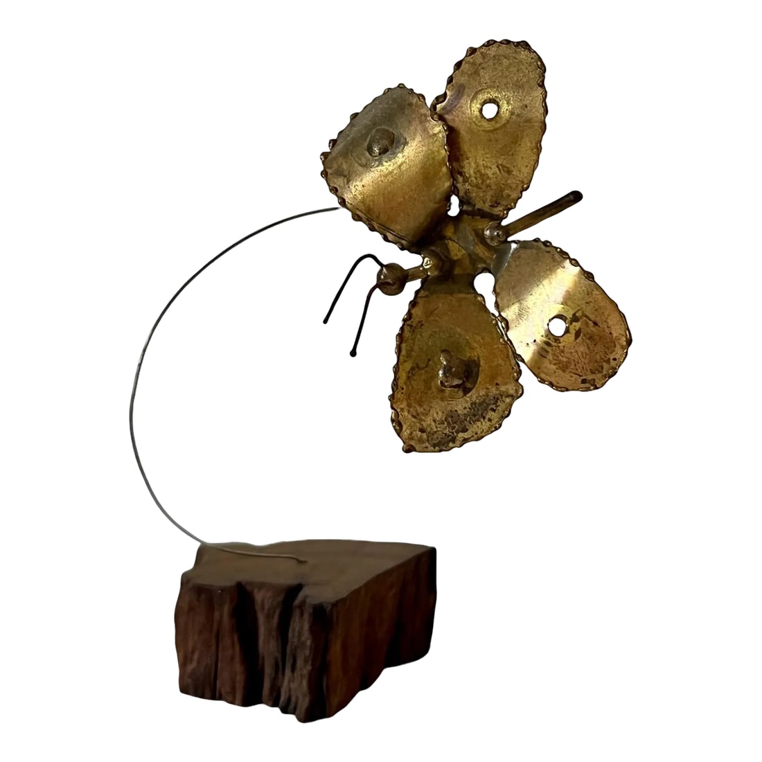 Brutalist Bouncing Butterfly on Wood Base: Mid-Century brutalist bouncing butterfly on wood base. No makers mark. Minor wear. Condition: Alterations: Original Condition Unaltered Imperfections: Some Imperfections Condition Notes: Minor age wea