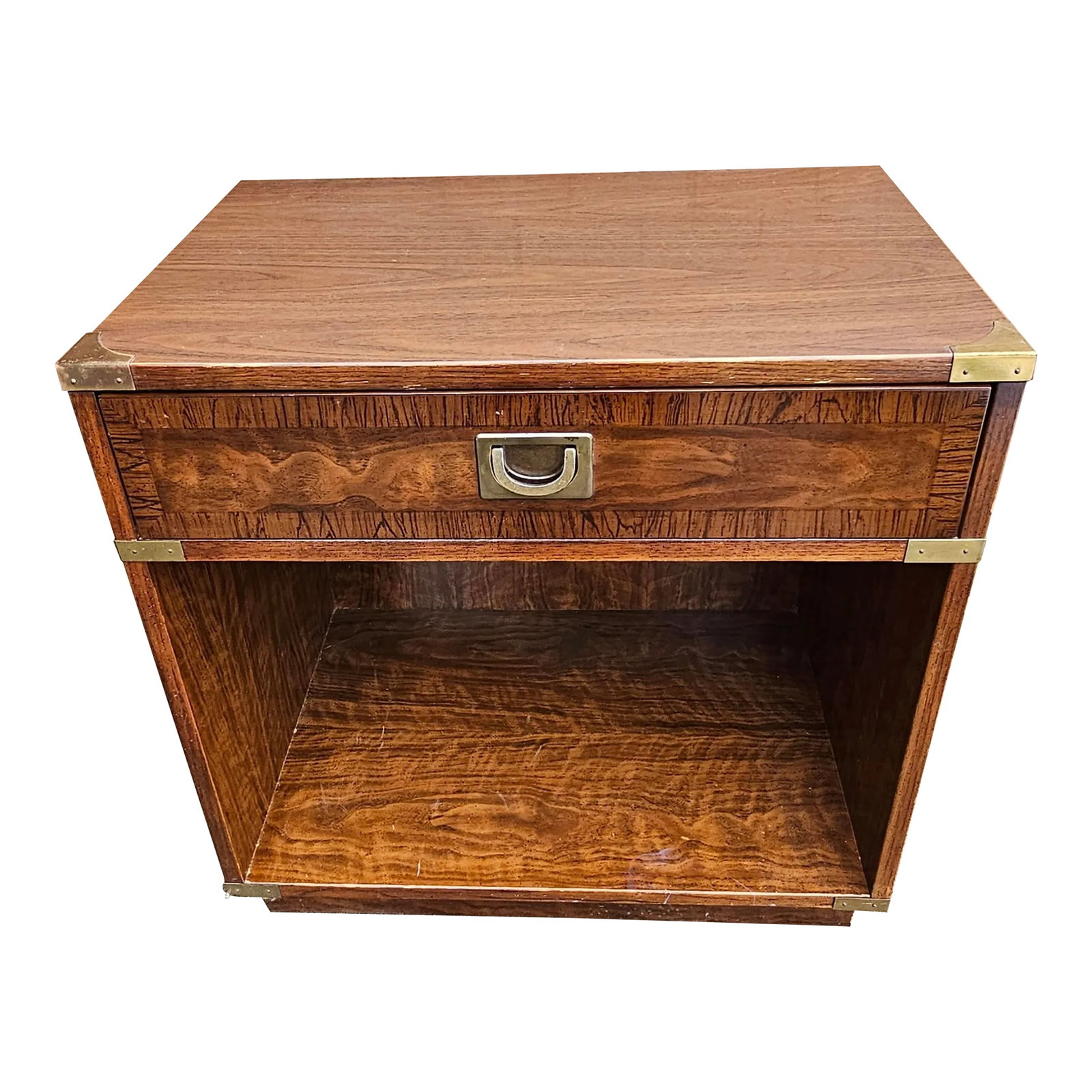 Drexel Furniture Mid-Century Campaign Style Bedside Table: A Mid Century Single drawer two tier campaign bed side Table by Drexel Furniture. Good vintage condition. Measures 23.5" in width x 16" in Depth x 24" in height Condition: Alterations: Original Condit