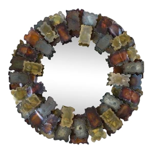 1970's Torch Cut Brutalist Designer Metal Mirror: Wild 70's torch cut brutalist designer metal mirror signed like silas seandel being sold as found in good condition measuring 27 inches in diameter. Mirror is signed with what looks like intials p. E.
