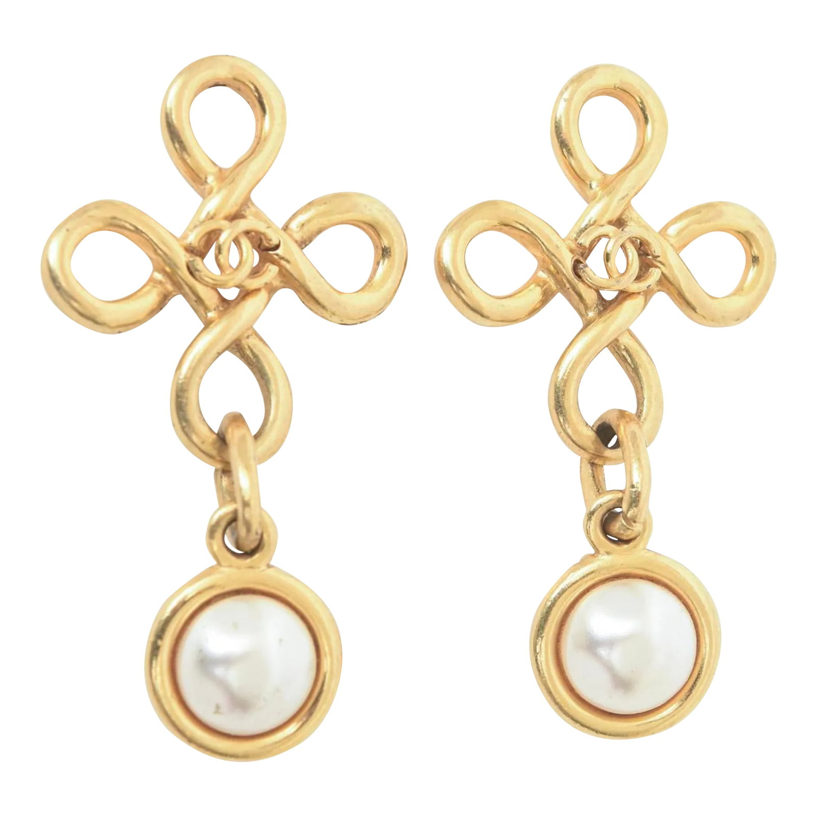 Vintage 1993 Chanel Gold Plated and Faux Pearl Clip on Dangle Earrings With CC's: This is part of Chairish's Costume Jewelry assortment. This fabulous pair of vintage authentic hallmarked Channel long dangle earrings are clip on and from the spring of 93. They have the twisted open