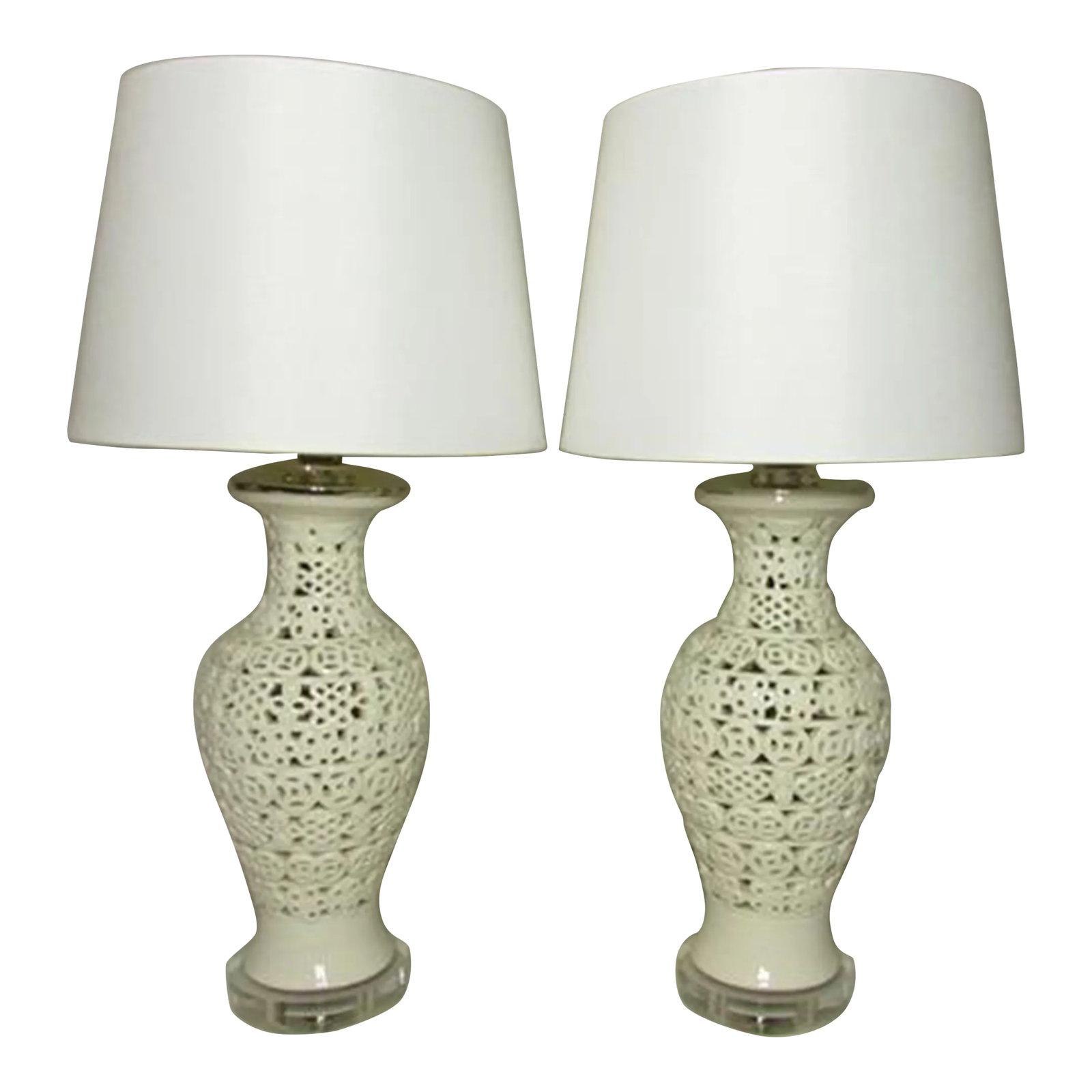 Pair of Chinese Blanc De Chine Porcelain Lamps: Pair of Chinese blanc de Chine porcelain lamps, c.1950's A good looking pair of lamps, the same shape and size, but with a slightly differing pierced porcelain geometric design. Mounted on lucite base