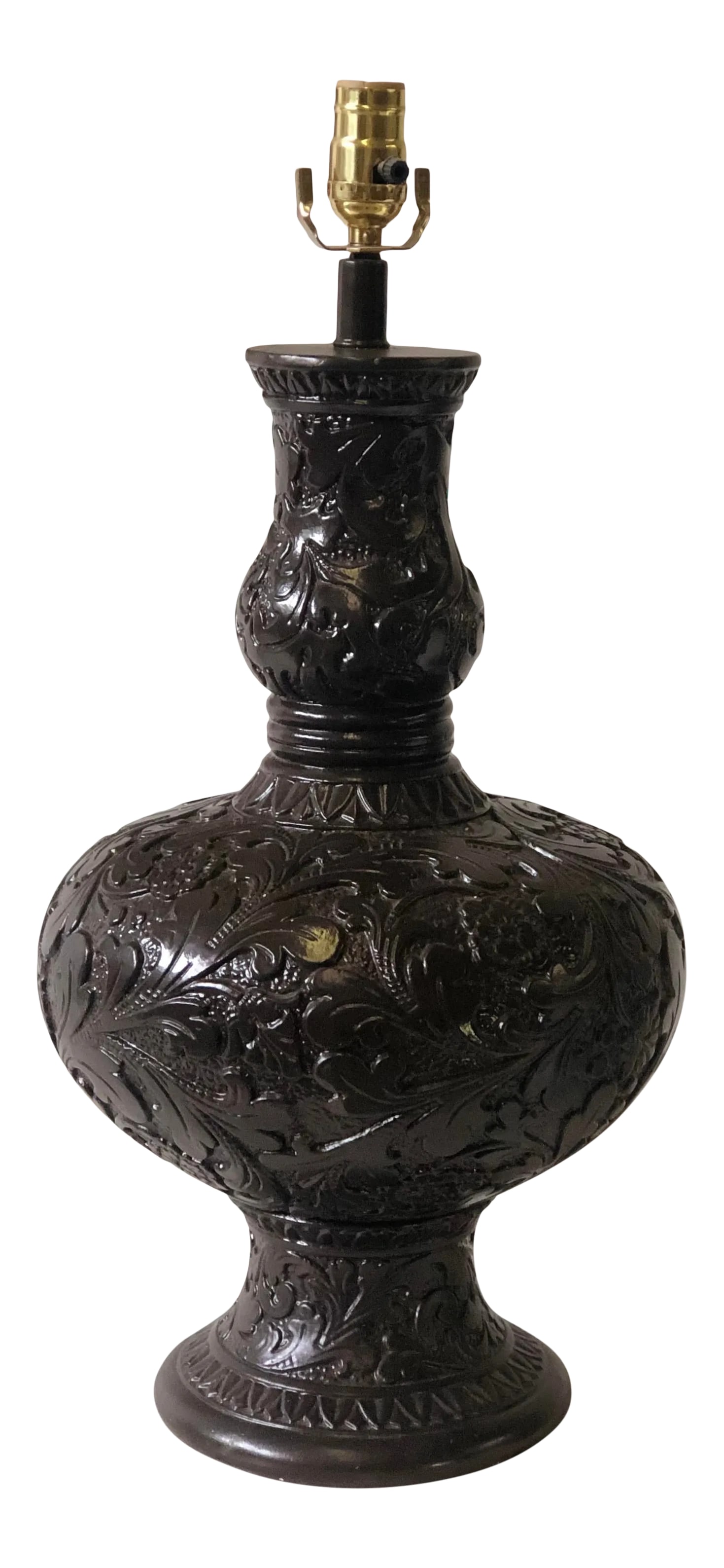 Classic Western Embossed Oak Leaf Pattern Lamp: 20th Century lamp cast from plaster into an urn shape with a relief of a classic western oak leaf and floral pattern. The lamp has the original vintage chocolate brown paint finish. Condition: