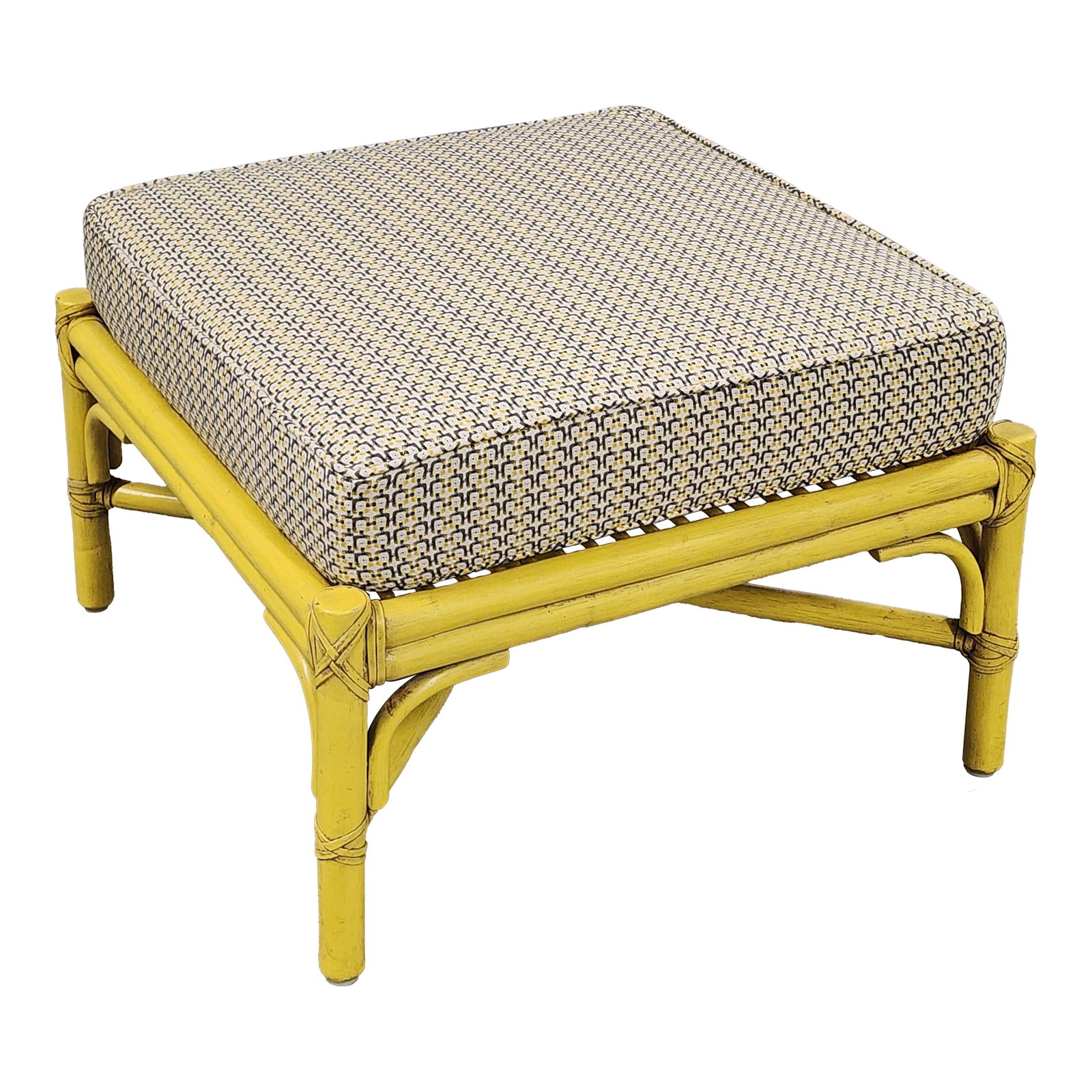 Mid-Century Modern McGuire Painted Bamboo Ottoman: Mid-Century Modern McGuire yellow painted faux bamboo and rattan ottoman, featuring an updated upholstery fabric with a geometric design to bring a pop of color in your home. It's a great center piece