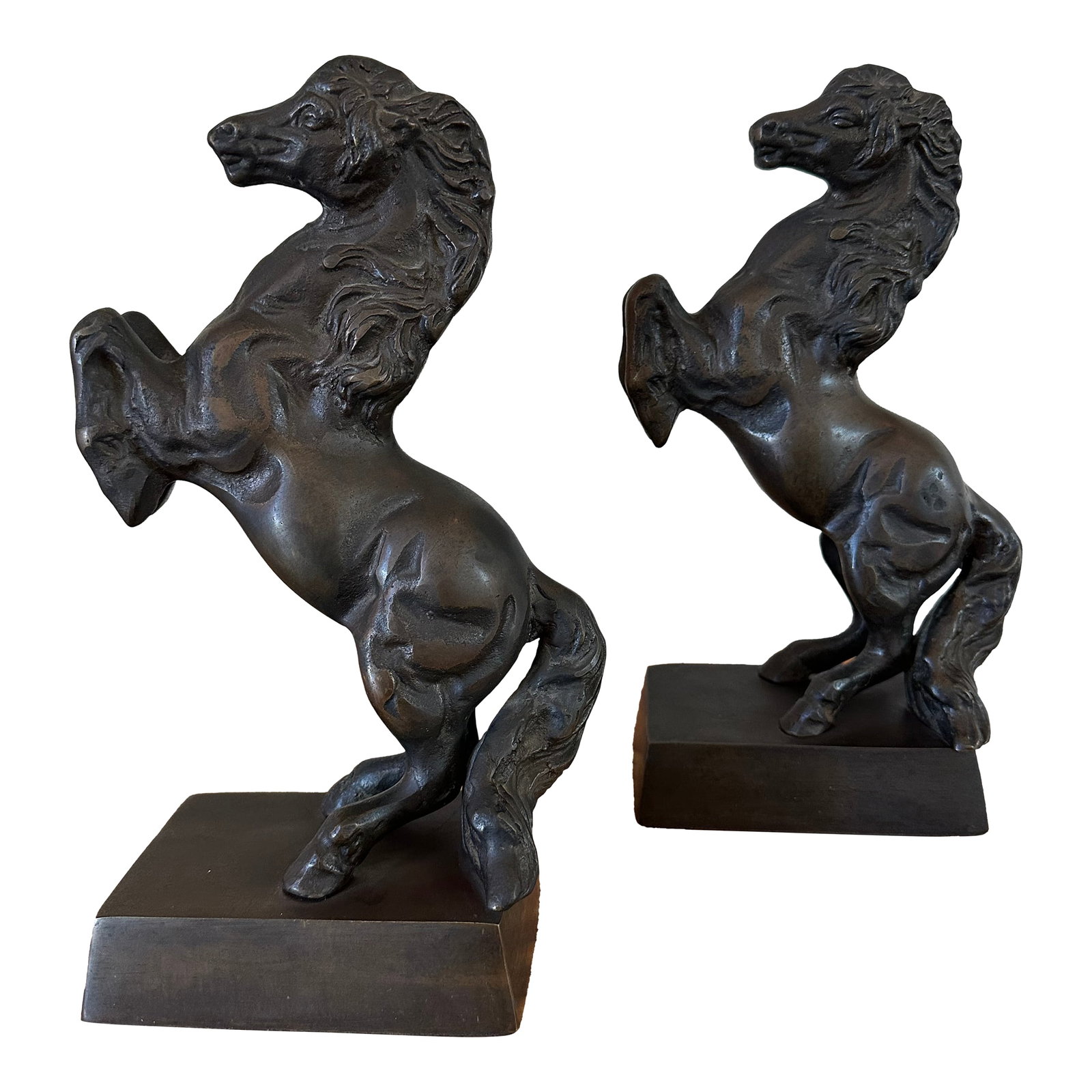 Vintage 1970's Bronze Finish Horse Sculptures -a Pair: Terrific pair of vintage 1970's bronze finish rearing stallion horse sculptures. Cast metal base with a gorgeous patina. Very heavy. Set upon a 1" plinth. Felted bottoms. Can also be utilized as booke