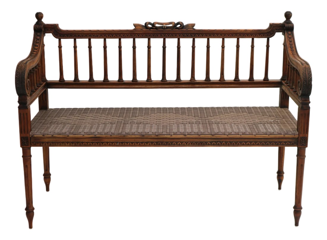 Late 20th Century Louis the XVI Style Maitland-Smith Carved Garden Settee: Stunning hand-carved bench or settee done in Louis XVI style. It features a strong faux cane resin seat and rich ornaments carved into wood typical for the second half of the 19th century. Due to its