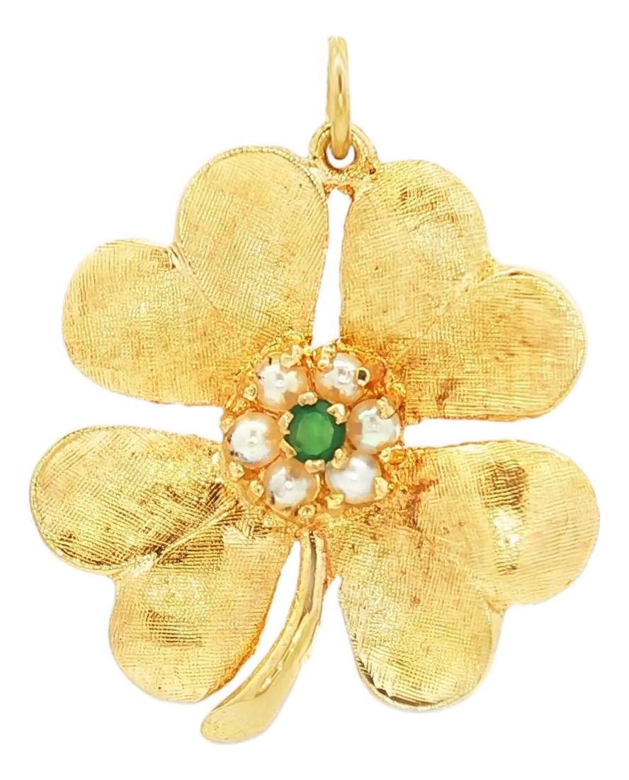 Vintage 14kyg Four Leaf Clover Charm With Cultured Pearls and Green Onyx: A mid-century 14k yellow gold four-leaf clover charm. The charm features florentine textured heart-shaped leaves. At the center, a cluster of white cultured pearls surrounds a round green onyx. In