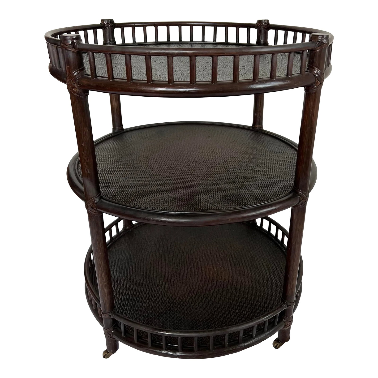 1990s McGuire Three Tier Ebonized Rattan Rolling Bar Cart: McGuire Three Tier Ebonized Rattan Rolling Bar Cart with brass wheels in excellent vintage condition. Condition: Alterations: Original Design Modified Imperfections: Some Imperfections Condition Notes