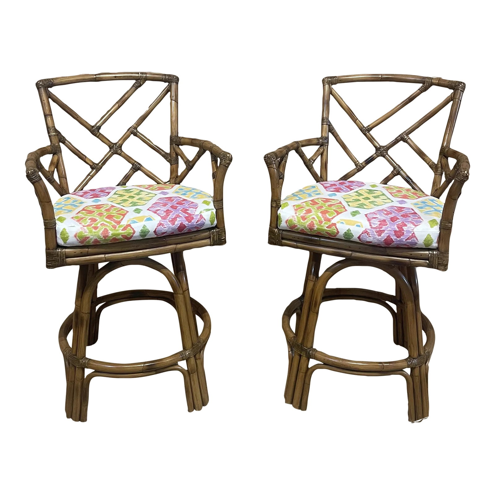 Lane Venture Tradewinds Rattan Swivel Bar Stools - a Pair: Lovely pair of rattan barstools from the Lane Venture Tradewinds collection available. These swivel a full 360 degrees. Bar stool cushions have been recovered in a beautiful fabric. We also have the