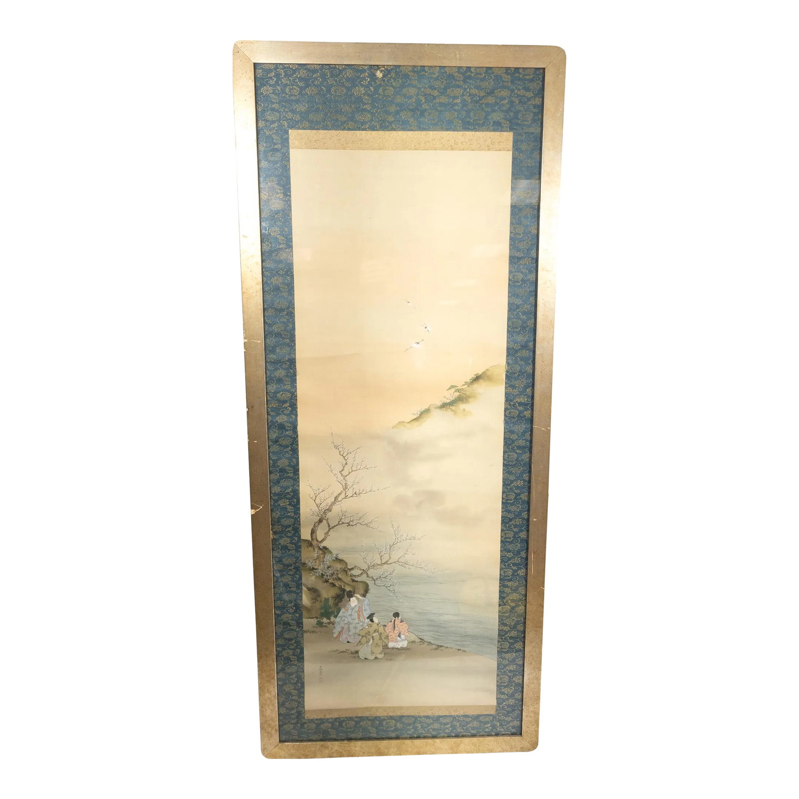 Early 20th Century Japanese Silk Scroll Painting of Figures on a Shore: We are selling this nice 19th or 20th century Japanese scroll painting on silk with three figures by a shore that is signed and well framed. Condition: Good antique condition. Dimensions: Height 56
