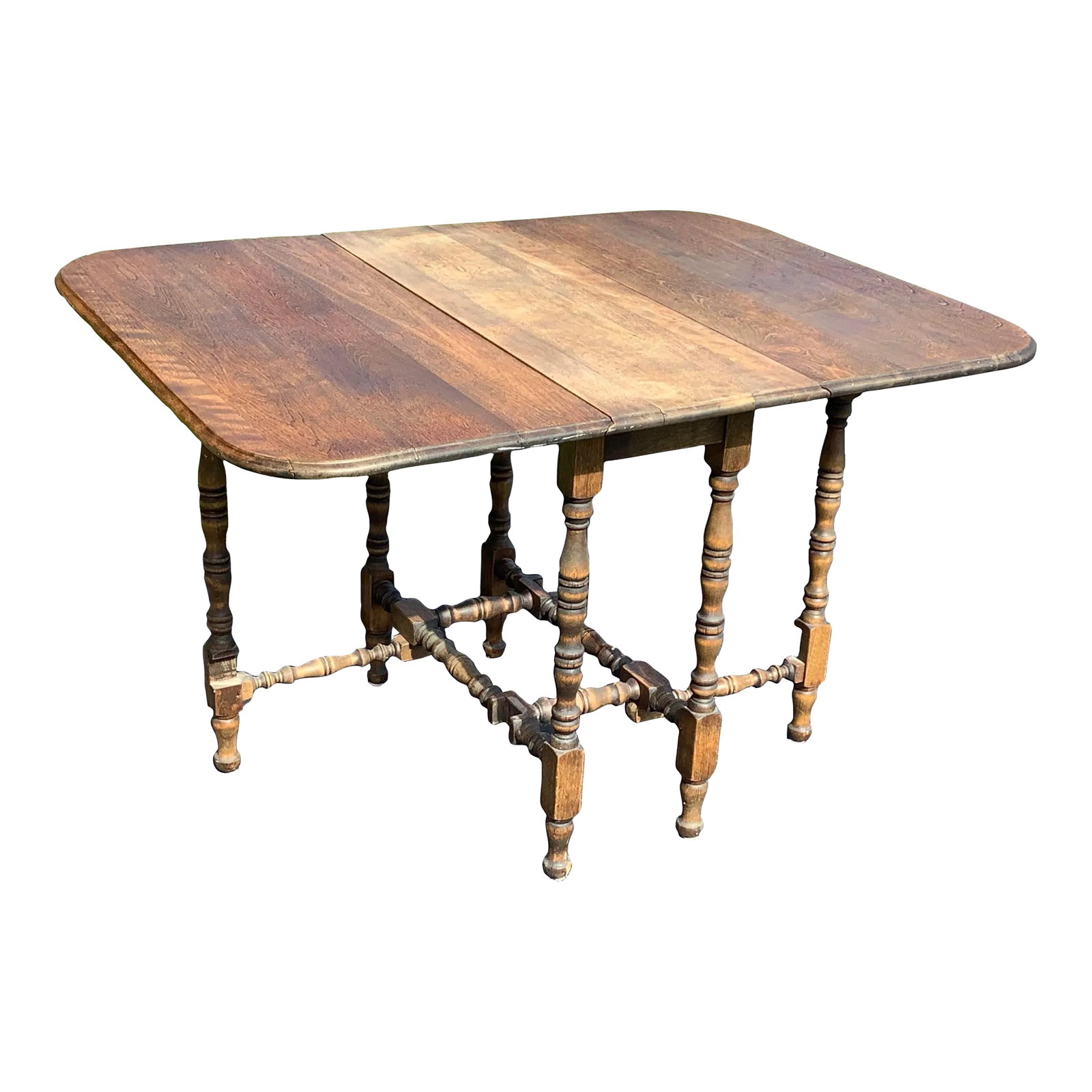 Antique English Gate Leg Table: Antique turned gate leg table. Circa late 1800's Wonderful patina, walnut construction. Stores away in under 2 ft width, opens to 60 inches with both leaves deployed. Condition: Alterations: Original 