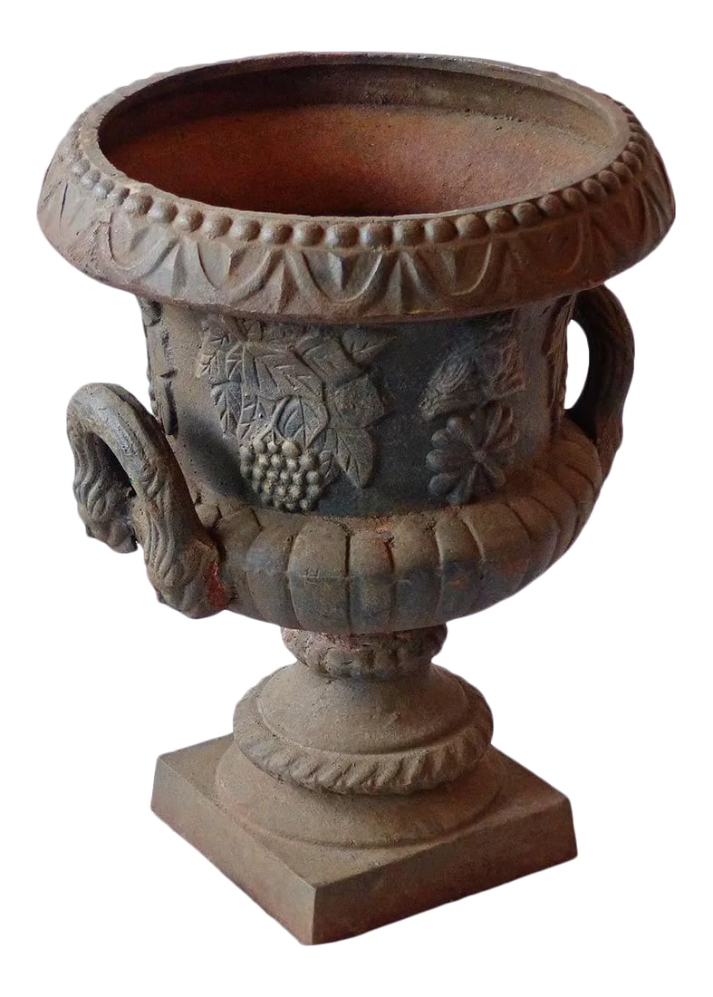 Cast Iron Garden Urn Victorian Style: Vintage Victorian style cast iron garden urn with ribbed bowl, egg-and-dart border, and handles. featuring classic decorative elements with ribbed bowl, an egg-and-dart rim pattern, grape vine