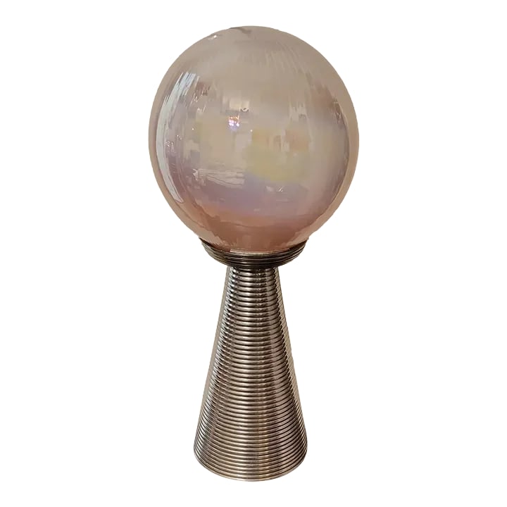 1980s Polished Aluminum Tower and Glass Globe Table / Floor Lamp: This pinkish glass globe rest on a polished aluminum tower that together stand at 19'. The 9 " globe has a pinkish base color with a rainbow of other colors that changes with its location reflective