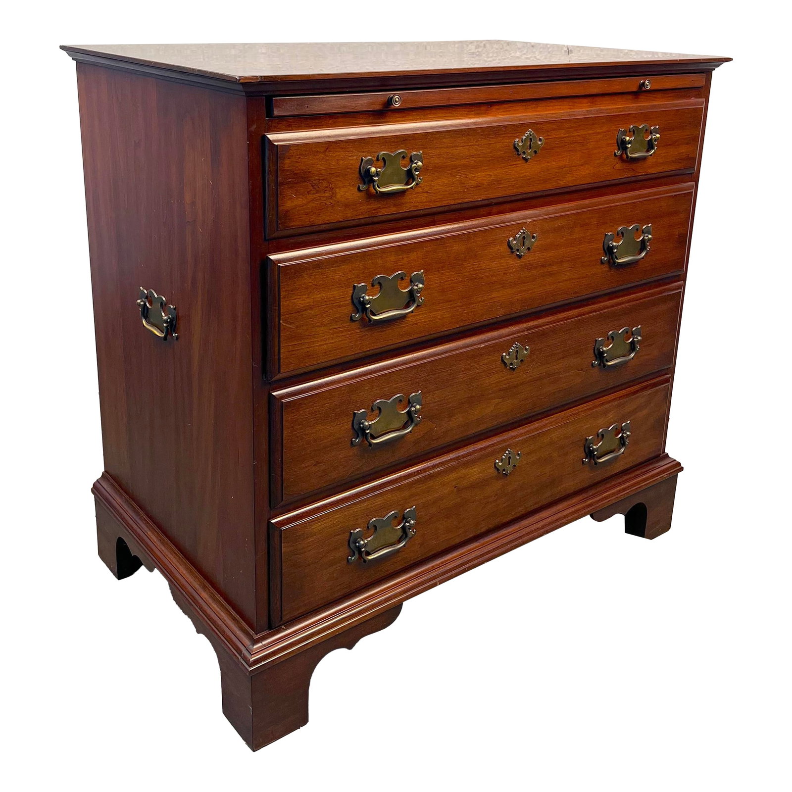 Chest of Drawers by Pennsylvania House: Charming dresser crafted in rich walnut, showcasing a streamlined form and warm natural grain. Compact yet functional, it offers versatile storage and a refined presence, making it a great addition