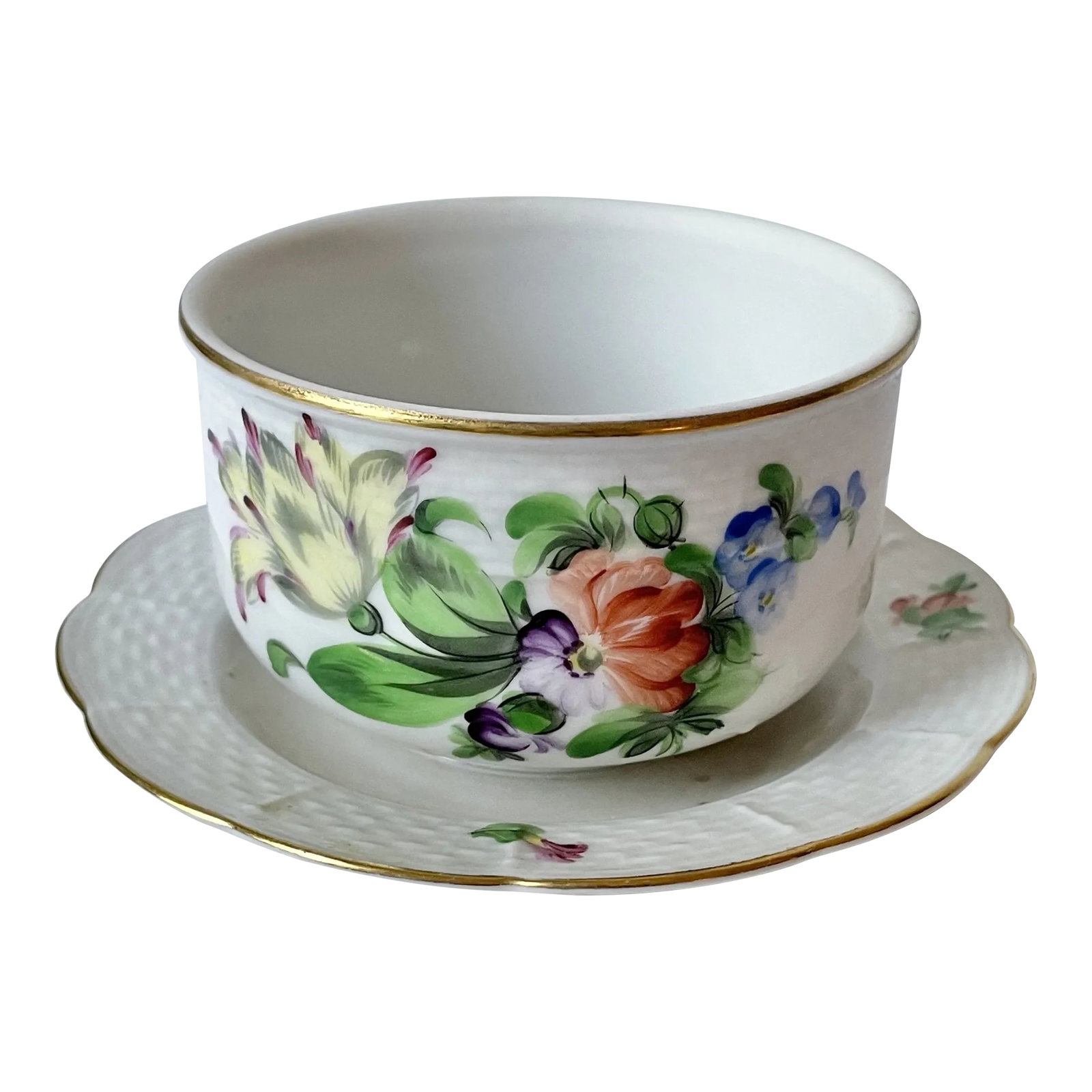 Vintage Herend Porcelain Printemps Pattern Serving Dish and Stand: This Herend serving bowl with fixed stand is in the Printemps pattern. The sides of the bowl are hand-painted with a spray of pink, yellow and blue flowers, the sides of the bowl, top of stand and und