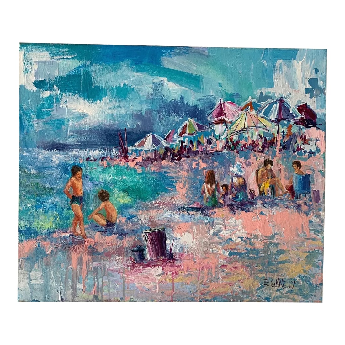 Mid 20th Century Expressionist Coastal Scene Oil Painting: Colorful, impressionistic depiction of busy, summertime beach side scene, by E.Garely. Women sitting looking at the sea, children playing all amongst the backdrop of a beautiful array of pastel umbrel
