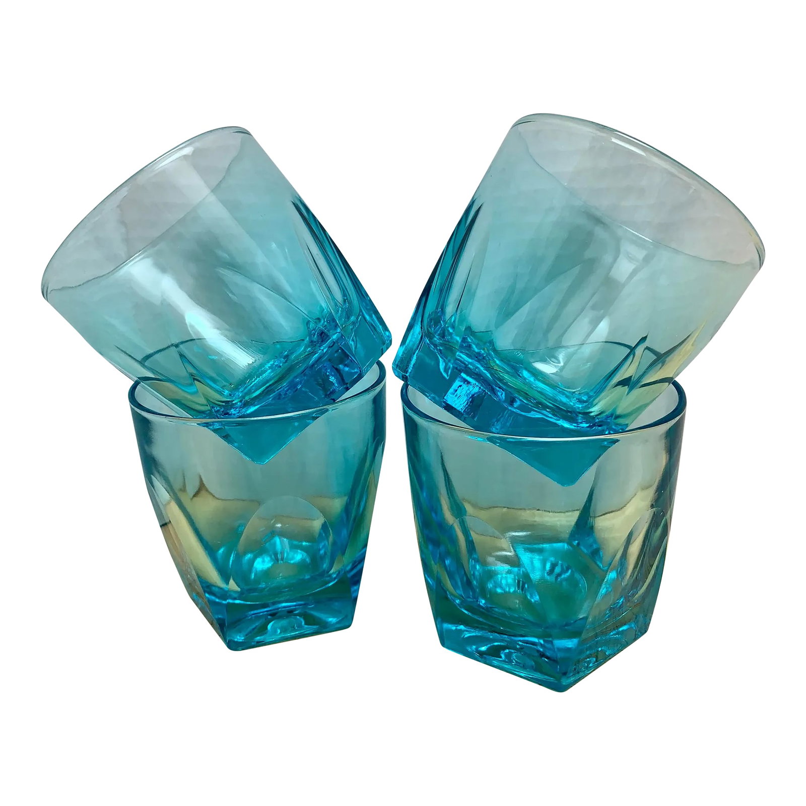 Vintage Blue Lowball Glasses- Set of 4: Swanky set of aqua blue cocktail glasses with groovy prism cut design. Set of four Condition: Alterations: Original Condition Unaltered Imperfections: Some Imperfections Condition Notes: Excellent