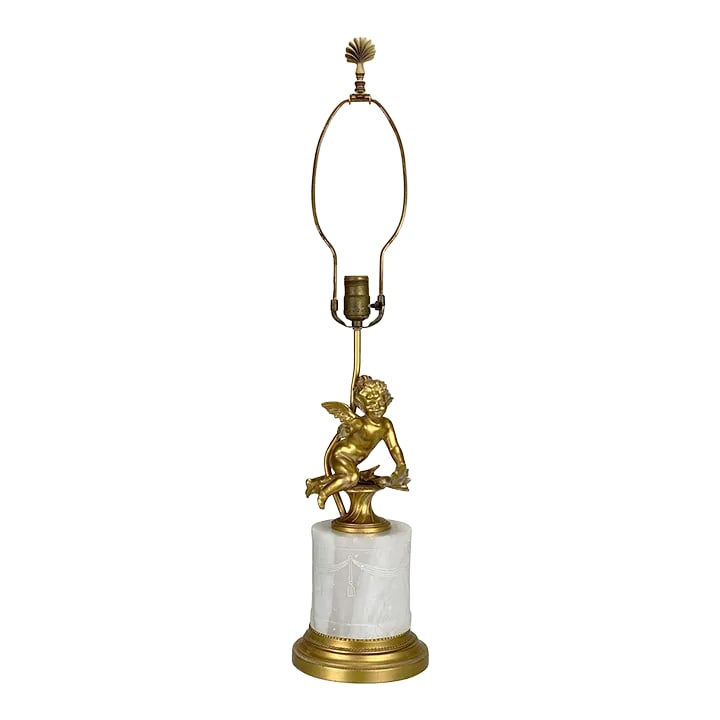 Vintage Italian Rococo Gold Gilded Cherub Onyx Table Lamp: An Italian Rococo Gold Gilded Cherub Onyx Table Lamp, c.1970. This Table Lamp would look exceptional while displayed in an array of interior styles. The Cherub Motif is finished in an original gold