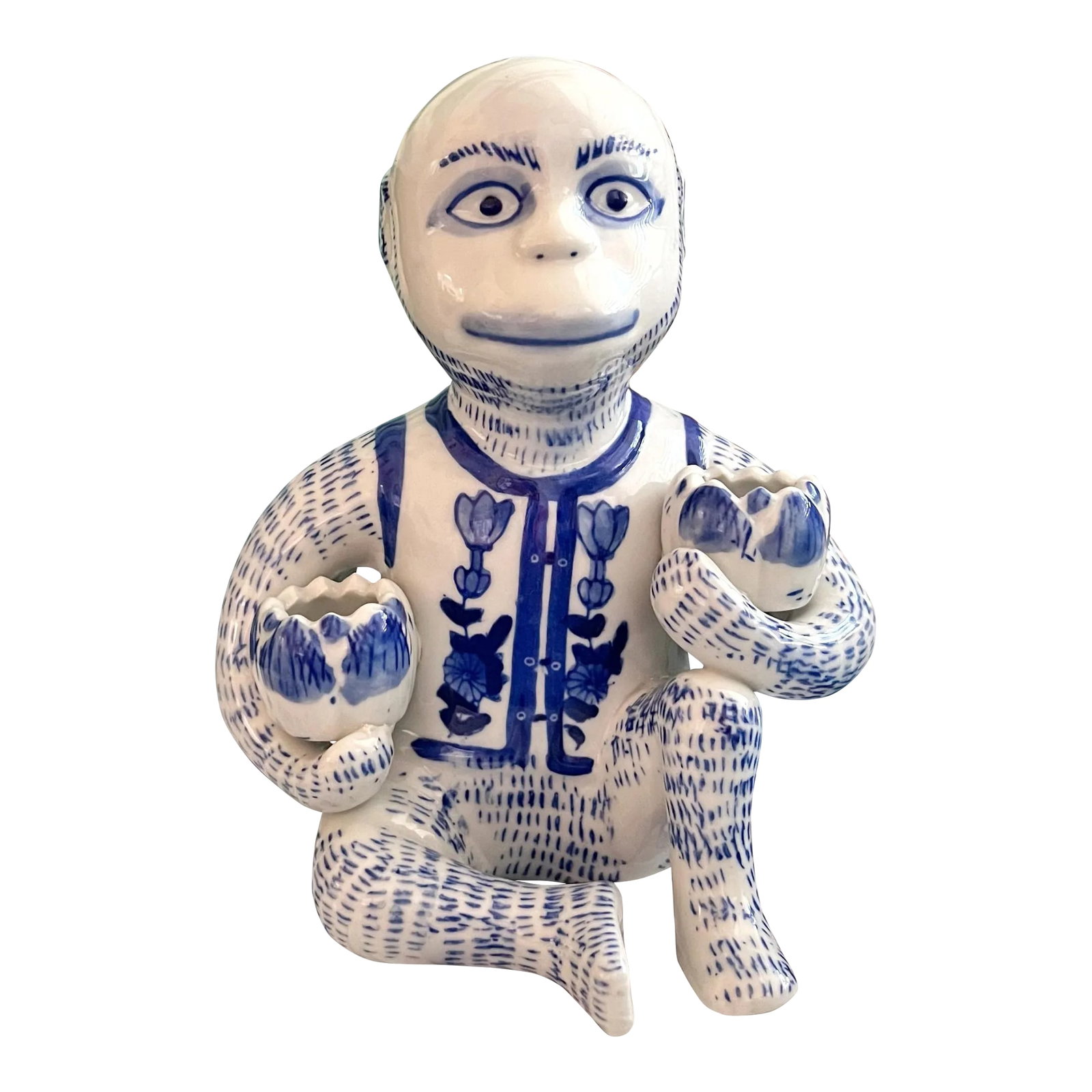 Late 20th Century Chinoiserie Blue and White Monkey With Lotus Flower Bowls: Vintage blue and white ceramic monkey with small lotus bowls that can be used as candle holders. Condition: Alterations: Original Condition Unaltered Imperfections: Some Imperfections Condition