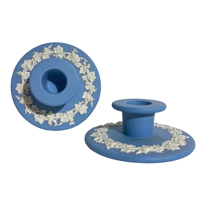 Vintage Blue and White Regency Wedgwood Candlesticks: Gorgeous baby blue and bright white ceramic Wedgwood candlestick holders with lovely floral wreath motif. So classic, yet modern. Condition: Alterations: Original Condition Unaltered Imperfections: