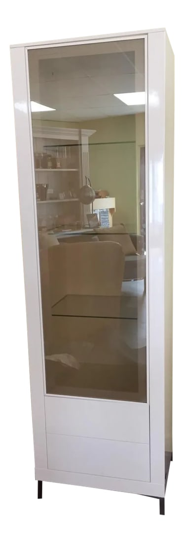 Contemporary Francisco Hurtado White Lacquer Display Cabinet: Modern white lacquer display cabinet. Touch latch door and two drawers. Chrome metal legs. Three glass adjustable shelves. No interior light. Condition: Imperfections: No Imperfections Condition