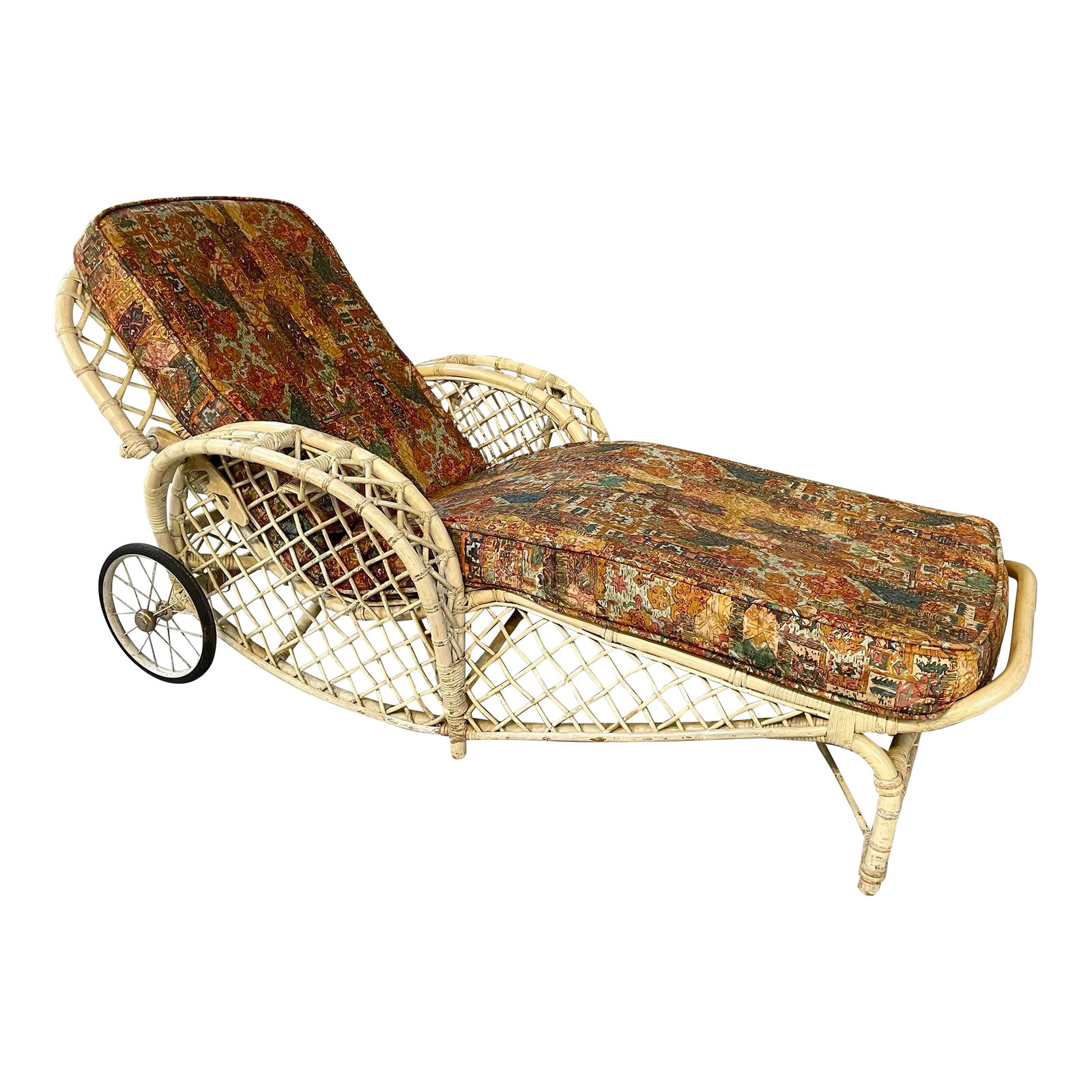 1960s White Rattan Bamboo Chaise Lounge: Victorian style revisited through 1960s rattan. This vintage chaise features a magazine rack built into one arm, a drink holder on the other. Back height can be adjusted to three different settings. L