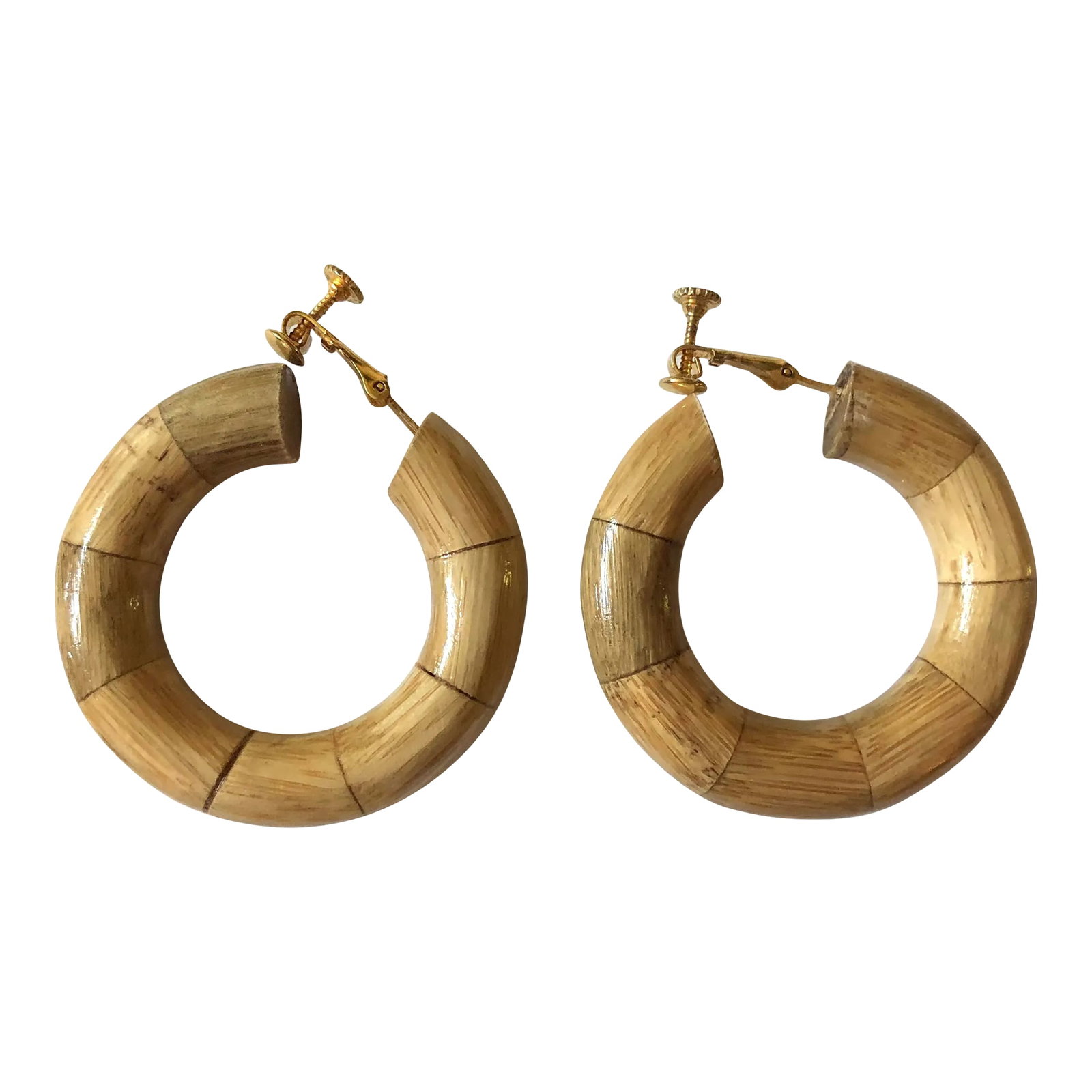 Vintage Les Bernard Real Bamboo Hoop Earrings - 2 Pieces: This is part of Chairish's Costume Jewelry assortment. This pair of Vintage Les Bernard Real Bamboo Hoop Earrings are sure to garner lots of attention for both their natural bamboo material and