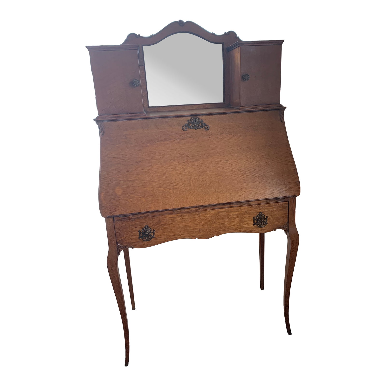 Antique Art Nouveau Oak Secretary Ladies Writing Desk: Here we have a beautiful antique solid quarter sawn oak Ladies Writing Desk. So many lovely details such as a scalloped top with beveled mirror, original carved appliques and beaded trim, a large