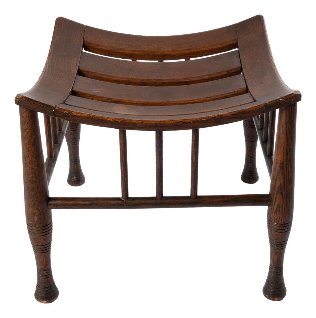 Early 1900s Antique Oak Thebes Stool: Antique Oak Thebes Stool with original finish, unique slatted construction and turned legs. Condition: Alterations: Original Condition Unaltered Imperfections: Some Imperfections Condition Notes:
