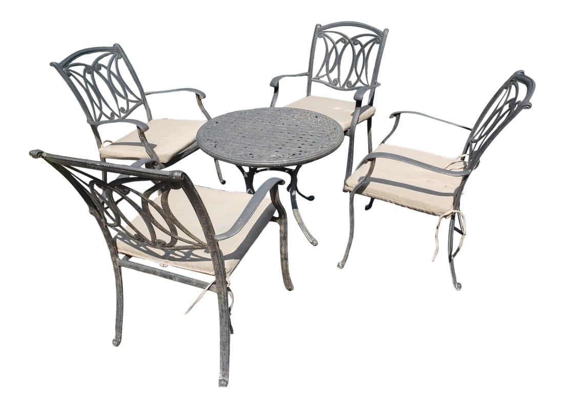 Vintage Cast Aluminum Patio Table & 4 Armchairs With Cushions Set: Vintage Cast Aluminum UV and Rust Resistent STACKABLE Patio Armchairs with Cushions and table set with Cushions. Frame very durable,, Water Resistent; UV Resistant; Resistant and Rust Resistant. Good