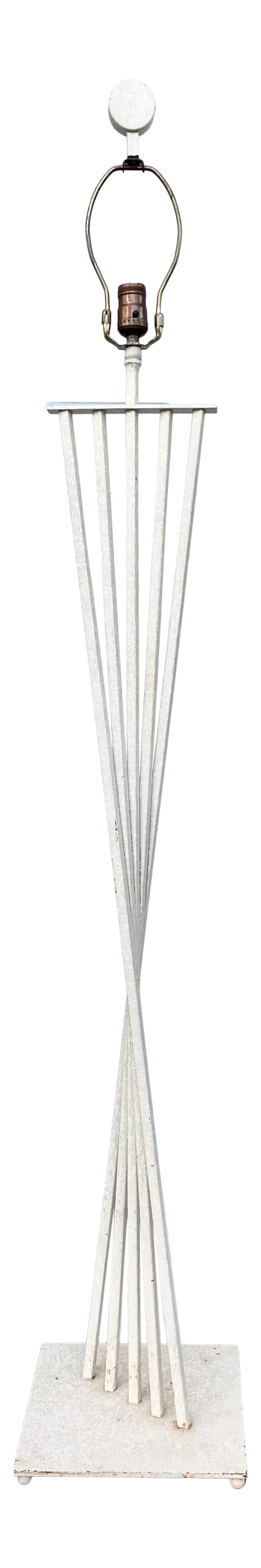 1980's Postmodern Minimalist Steel Floor Lamp: Interesting "twisted" metal bar Post-mod floor lamp. It has an hourglass look from the front, but from the side it looks Wider at the base, tapering towards the top. The light is coated in a textured