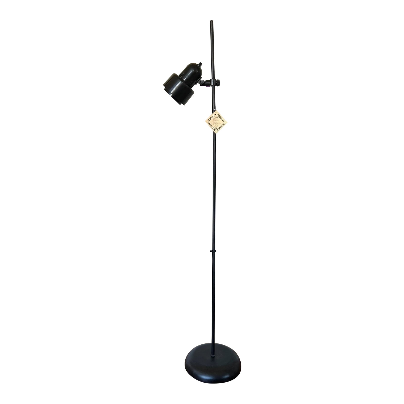 Mobilite 580 Adjustable Floor Lamp, 1970s, With Original Tags: New vintage stock, tags still attached, was in storage for 45 years. Rare item. Adjustable floor reading lamp from Mobilite, made in Thailand. Light is movable along length of pole so you can match